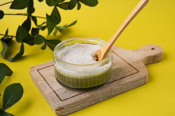 Healthy Thai dessert with coconut cream on top. vegetarian and vegan sweets made from pandan. The traditional food.