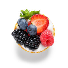 Tasty tartlet with whipped cream and berries on white background