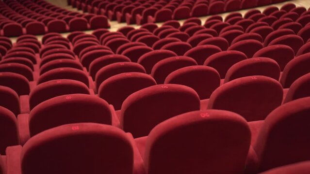 Red chairs of the empty theater