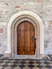 Medieval wooden door with in historical church