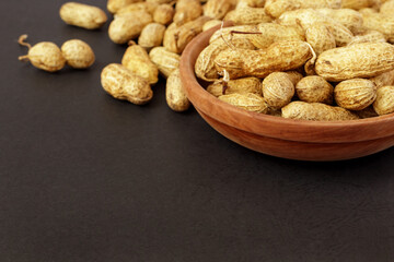 Roasted peanuts, peanuts in shell Isolated on black background