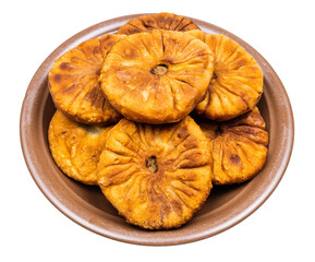 many peremeches on plate (fried pastry stuffed with minced meat) isolated on white background