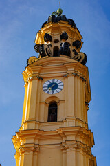 Fototapeta na wymiar clock tower of Theatine Church (Theatinerkirche) in Munich