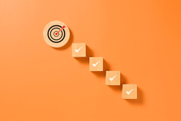 Wooden block of target goal with correct icons, Business strategy planning management, Business...