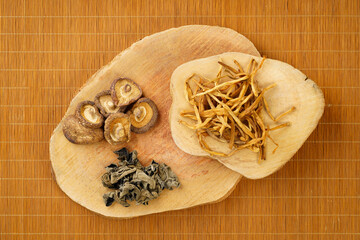 Various dried mountain delicacies on a monochrome background