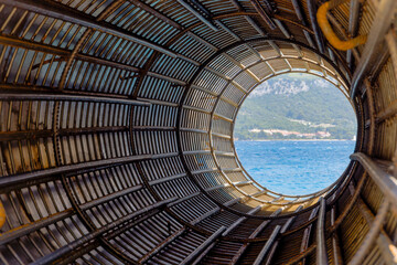 Unusual View of Adriatic Coastline Through Wire Cylinder