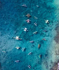 Fototapeten view of canoes in hawaii © Matthew