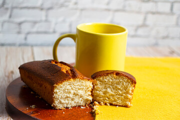 Two pieces of  cake and a mug of hot chocolate
