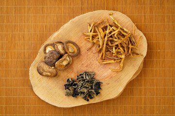 Various dried mountain delicacies on a monochrome background