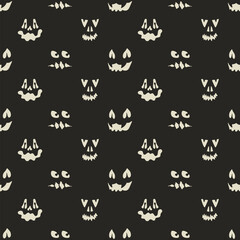 Halloween seamless pattern with spooky faces in cartoon style. Scary and creepy silhouette of faces for Halloween. Pattern with frightful faces for Halloween design.