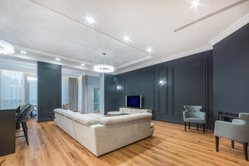 The magnificent interior of a luxurious mansion. Parquet floor, classic furniture, .beautiful room decor.