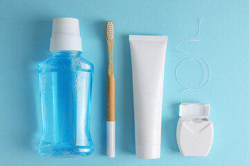 Oral hygiene products on a colored background with space for text 
