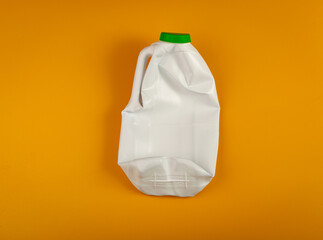 Empty Plastic Milk Bottle, Crumpled White Plastic Bottle, Global Pollution Concept, Squashed Pet...