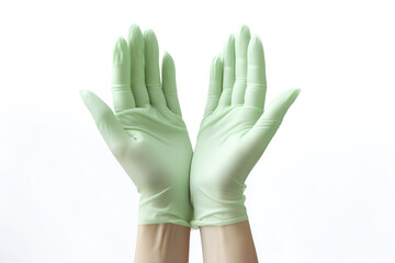 Medical gloves. Two green gloves isolated on white background with hands. Rubber glove manufacturing, human hand is wearing a latex glove. Putting on protective gloves