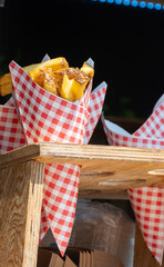 Traditional street food in Belgium and Netherlands, French fried potatoes chips with mayonnaise...