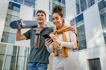 modern brother and sister or couple young man and woman walk outdoor