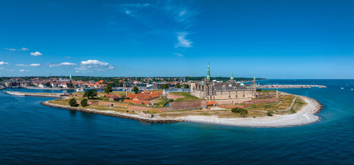 Fototapeta premium Aerial view of Kronborg castle with ramparts, ravelin guarding the entrance to the Baltic Sea and the Oresund in Helsingor Denmark