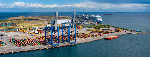 Conteiner docks in Copenhagen, Denmark. Large container cranes at a shipping terminal in the port...