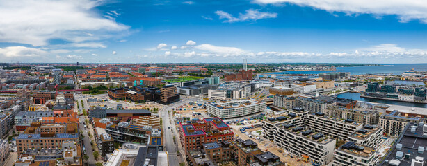 Aerial panorama of Indre Osterbro, Nordhavnen districts. New modern district in Copenhagen, Denmark. Beautiful modern buildings, Portland Towers and UN.