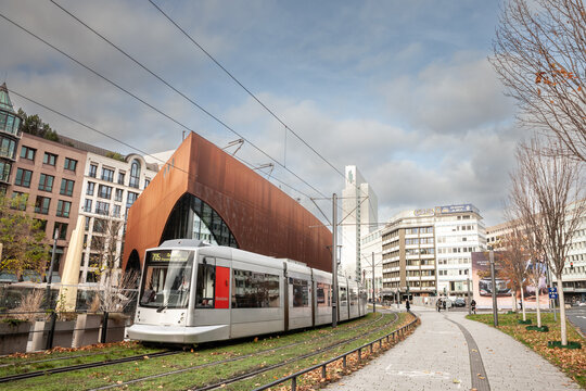 DUSSELDORF, GERMANY - NOVEMBER 7, 2022: Tram of the Dusseldorf tram system called Dusseldorf Strassenbahn, passing by the center of the city. Operated by Rheinbahn, it's a public transportation system