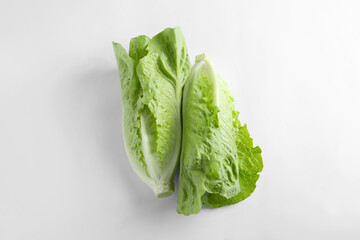 Fresh green romaine lettuces on white background, top view