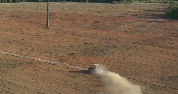Tractor Plowing Soybean Field on Formerly Deforested Amazon Rainforest Land
