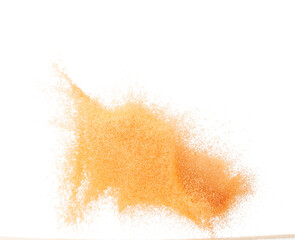 Small size orange Sand flying explosion, fruit sands grain wave explode. Abstract cloud fly. Orange colored sand splash throwing in Air. White background Isolated high speed shutter, throwing freeze