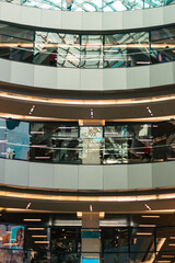 vertical view of floors in building with windows and transparency with natural light and metallic structures