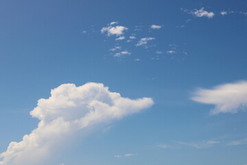 Varied White Clouds On Blue Sky