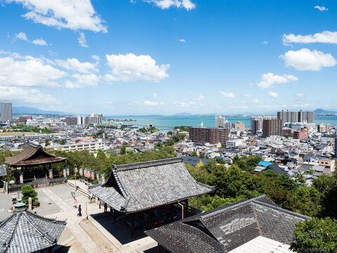 Otsu, Japan - August 21, 2018: Scenic view over the city of Otsu and Lake Biwa from Miidera, temple number 14 of the Saigoku Kannon pilgrimage