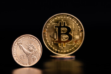 1 US dollar coin and coin with bitcoin cryptocurrency symbol on black background