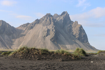 Costal Mountains of Iceland with Black sand Beach sand dunes 