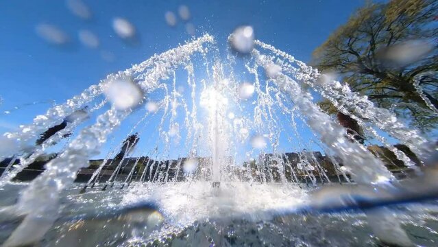 Slow Motion Shot of City Fountain on a Sunny Day.
