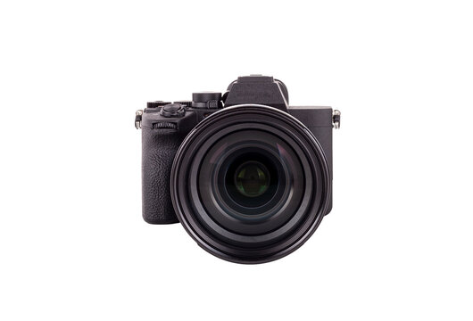 Front view of modern and brand new mirror less camera isolated on a white background with soft shadow