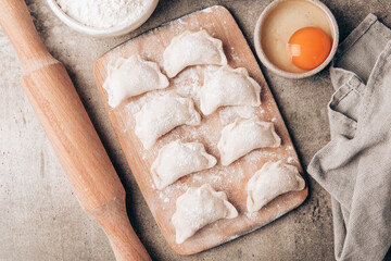 Cooking homemade dumplings or ravioli. National cuisine. Home cooking, handmade.