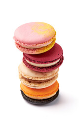 Stacking of 4 colorful macarons (pink, red, orange and cream-brown) isolated on white background.