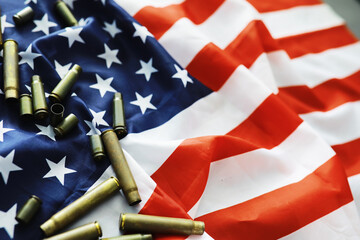 American flag on a gray background. Military background with bullets. USA and EU collective west.