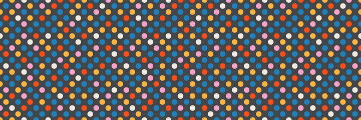 Simple vector polka dot geometric seamless pattern. Youthful dot texture repeat backdrop. Bright basic colors. Simple colorful retro background for web design, fashion, party, scrapbook or blog
