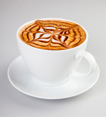 Close-up of cappuccino against white background