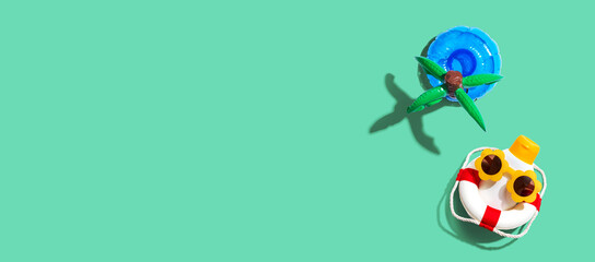 Fototapeta premium Summer sunblock sunscreen skincare theme - beach and swimming concept