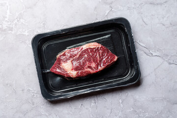 Raw beef ribeye steak