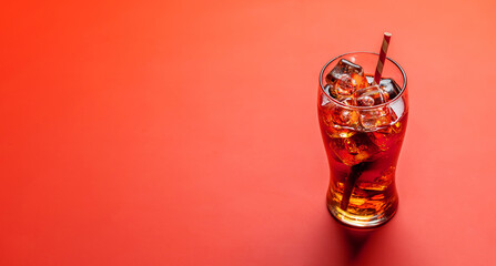 Refreshing glass of cola with ice - obrazy, fototapety, plakaty