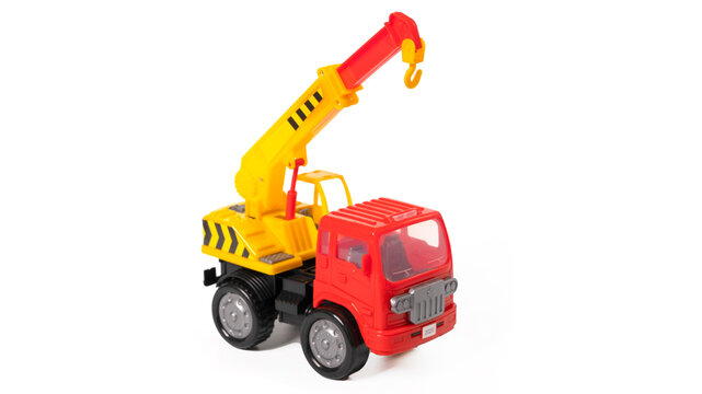Plastic toy crane car isolated on white background