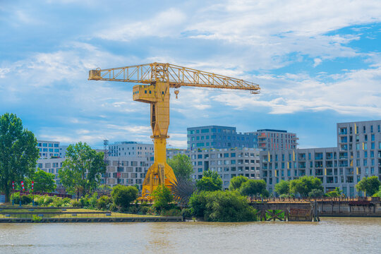 Nantes, France. View of the Grue Titan Jaune in the Nantes Island. It was built by Joseph Paris in 1954 and restored by Nantes city in 1989.
