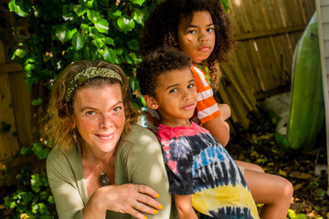 Portrait of a family in backyard