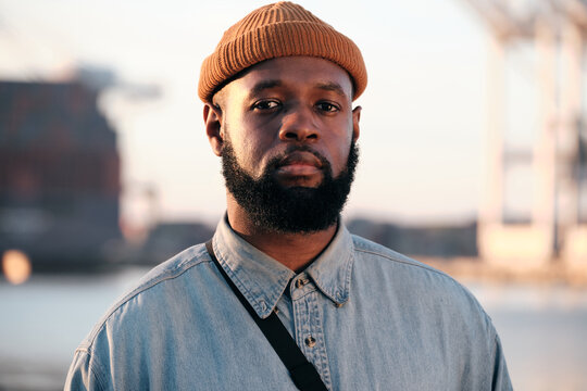 Portrait of an African American Man Amidst Sunny Port Vibes