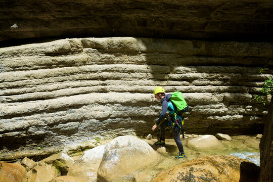 Woman canyoneering in Furco Canyon in Spanish Pyrenees