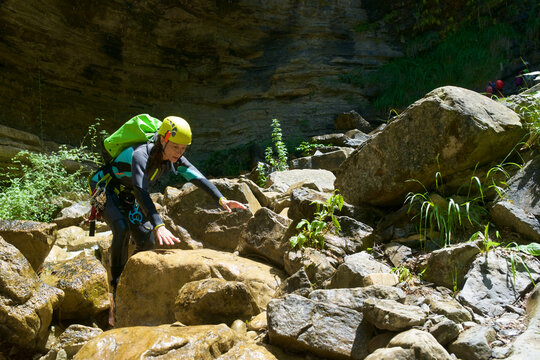 Woman canyoneering in Furco Canyon in Spanish Pyrenees