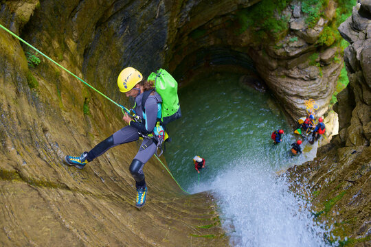 Woman canyoneering in Furco Canyon in Spanish Pyrenees