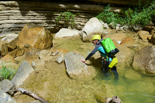 Woman canyoneering in Furco Canyon in Spanish Pyrenees